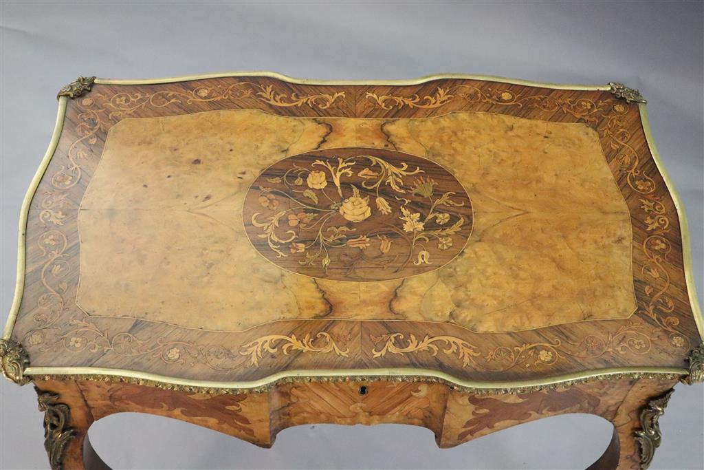 A late 19th century French ormolu mounted walnut, rosewood and marquetry writing table, W.3ft 1in. D.1ft 9in. H.2ft 6in.